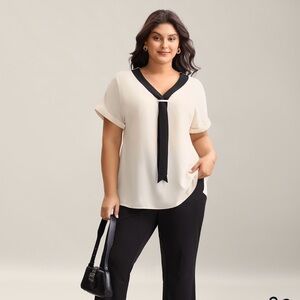 BloomChic Cream Blouse with Black Trim